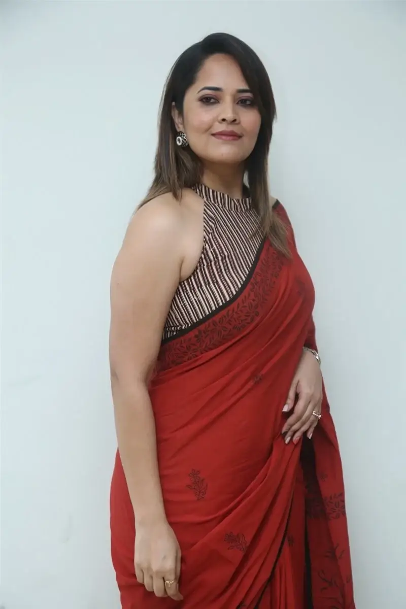 Hyderabad Girl Anasuya Bharadwaj in Red Saree at Movie Press Meet